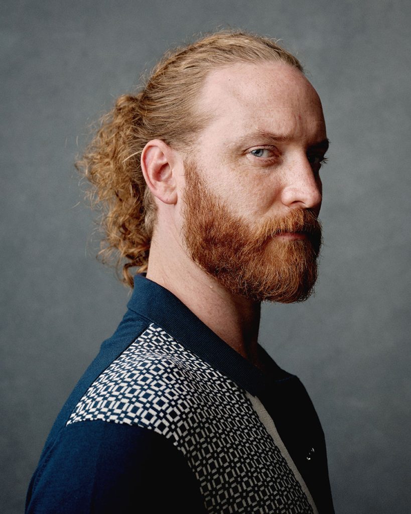 Brighton headshot of a man with red hair and beard photographed by Jacqui McSweeney
