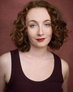 Brighton actors photographed against a pink background by headshot photographer Jacqui mcsweeney